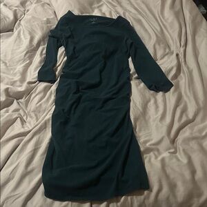 Elegant green maternity Dress. Ruching on sides of lower dress.